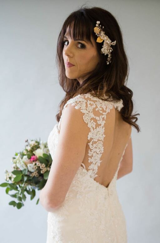 Rose Gold Freshwater Pearl Leaf Comb in brunette wedding hair with detailed lace wedding dress