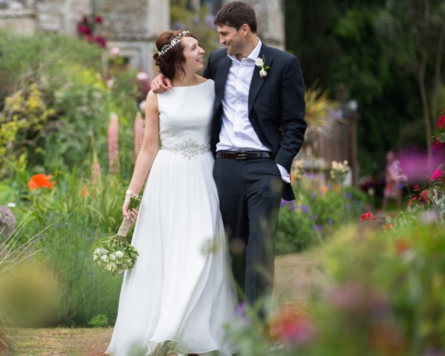 Bride wearing bespoke version of Bluebell combined with the Katherine Keshi Pearl Vine