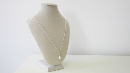 Evelyn necklace  with a single ivory freshwater pearl and silver crystal 