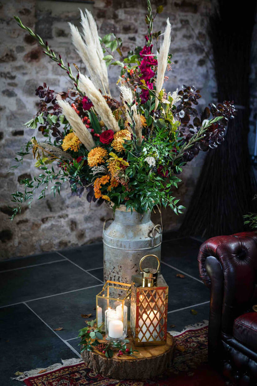 Autumn inspired wedding decor flowers and candles