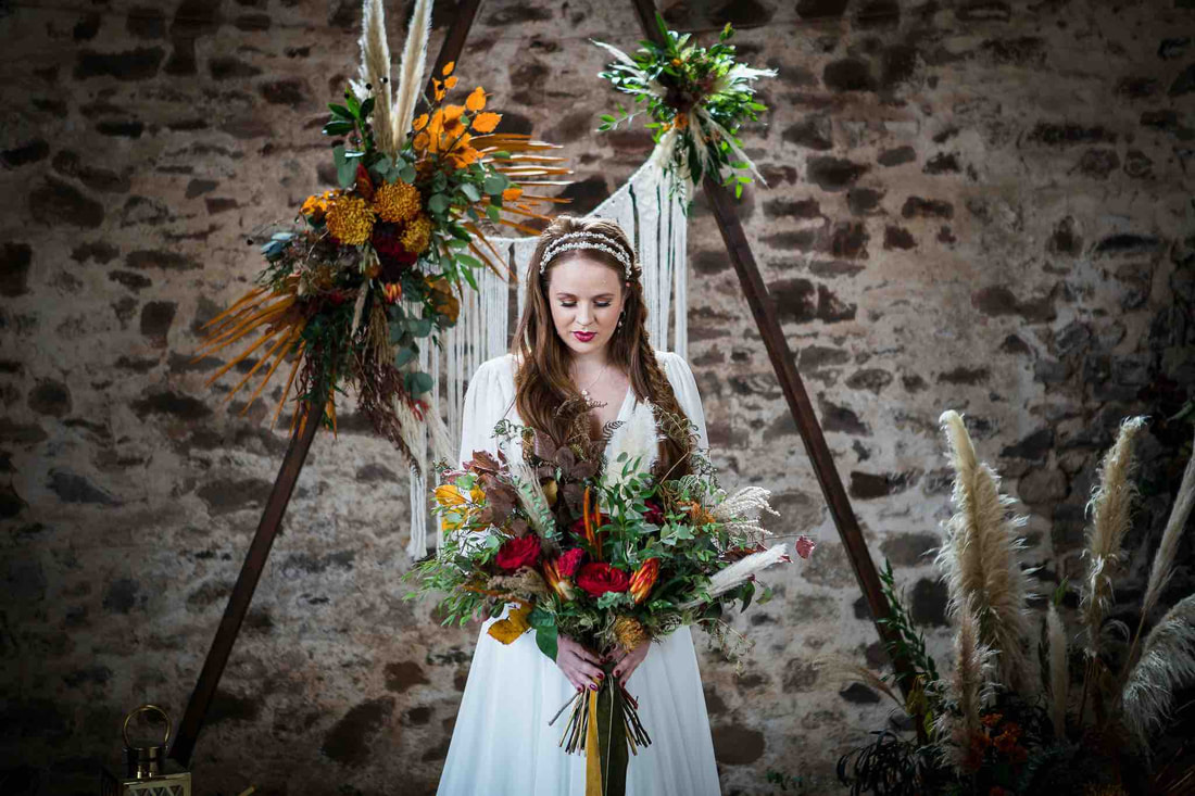 Bride, Flowers and Boho wedding backdrop